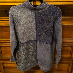 Blueish gray sweater with cowl neck . Pretty design on front  . Nice details